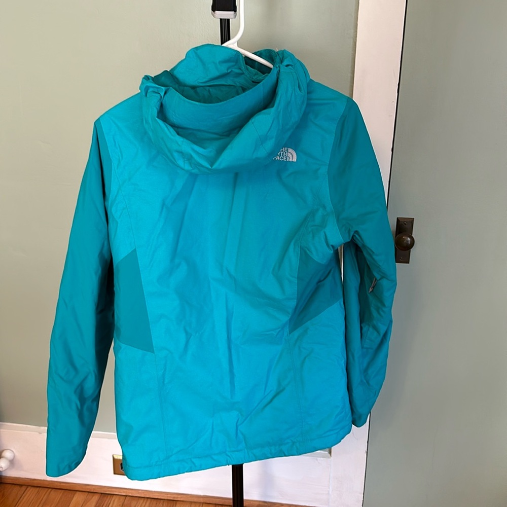 Women’s turquoise north face coat (size small)